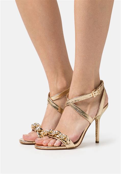 michael kors heeled sandals sale.